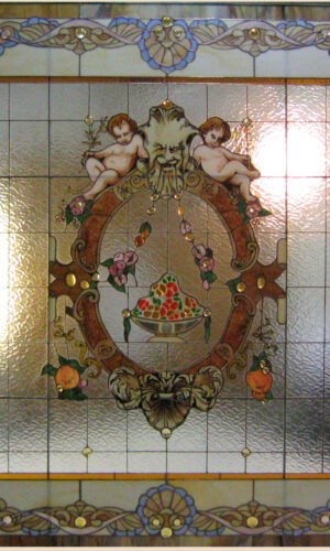 Artisan Stained Glass Window 5: Features two cherubs, a fruit bowl, and ornate floral and geometric borders.