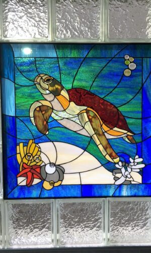 Art Insert Stained Glass Window Tortoise features a sea turtle with coral, bubbles, and a textured glass block frame.